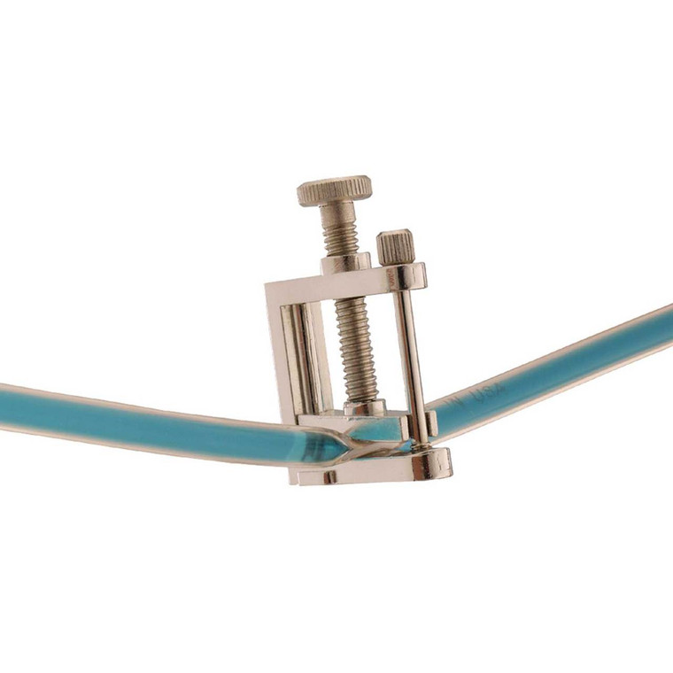 Photograph of a nickel-plated zinc hosecock pinching  down on a tube.