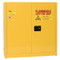 A photograph of a yellow 02008 eagle wall-mount flammable liquid safety cabinets, with 24 gallon capacity and both doors closed.