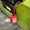 A photograph of an installed 07009 zing multipurpose forklift, plug and cylinder lockout device, opened.