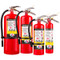 A group photograph of (left to right) Badger Standard 20, 10, 5, and 2.5 pound multipurpose dry chemical fire extinguishers.