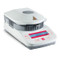 Photograph of an Ohaus MB23 Moisture Analyzer, closed, right-facing.