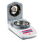 Photograph of an Ohaus MB23 Moisture Analyzer, empty, open, right-facing.