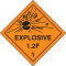 An orange and black photograph of a 03063 dot explosives shipping label, reading explosives 1.2F 1 with graphic.