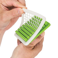 Pop-out pusher with removable grid for cleaning