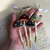 Embellished silk velvet mushroom ornaments with vintage ribbons
