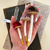 Small medium and large personalized velvet mushrooms shown in hand