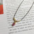 Faceted Drop and Roundel Gemstone Cord Necklace