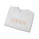 UTAH Maze Unisex Sweatshirt in white, ash, dark gray, navy with orange maze like lettering in a light blue box design established 1896