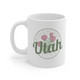 Bloom in the Desert Utah coffee mug with prickly pear cactus flowers in sage green and pink