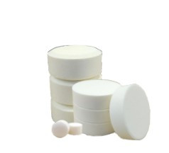 Solid tablets for closed loop water treatment