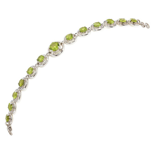 7 1/4 inches in length; 13 Peridot gemstones TCW 12.64 cts - details below 7 1/4 inches in length; 13 Peridot gemstones TCW 12.64 cts - details below