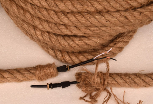 18/2 electrical cord covered with 1" diameter jute rope.  Shipped with two sets of grippers and rope strands to tie off ends.