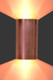 Copper half cylinder wall light with up and down lighting.  This is an image of a sconce 5.5" wide x 11" tall.  A taller sconce will create a narrower light dispersion.