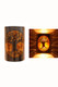 Day and night view of dark antique copper and amber mica Tree of Life wall sconce.