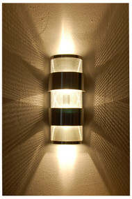 This photo shows the great light display that this contemporary or transitional wall light provides when combined with clear light bulbs.  Two bulbs are required in each fixture for uniform up and down lighting.