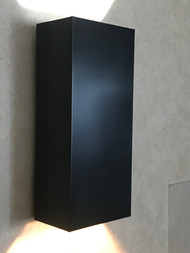 This is a simple yet elegant sconce and is very versatile for interior or exterior. They can also have a clear acrylic top for  wet locations outside. 