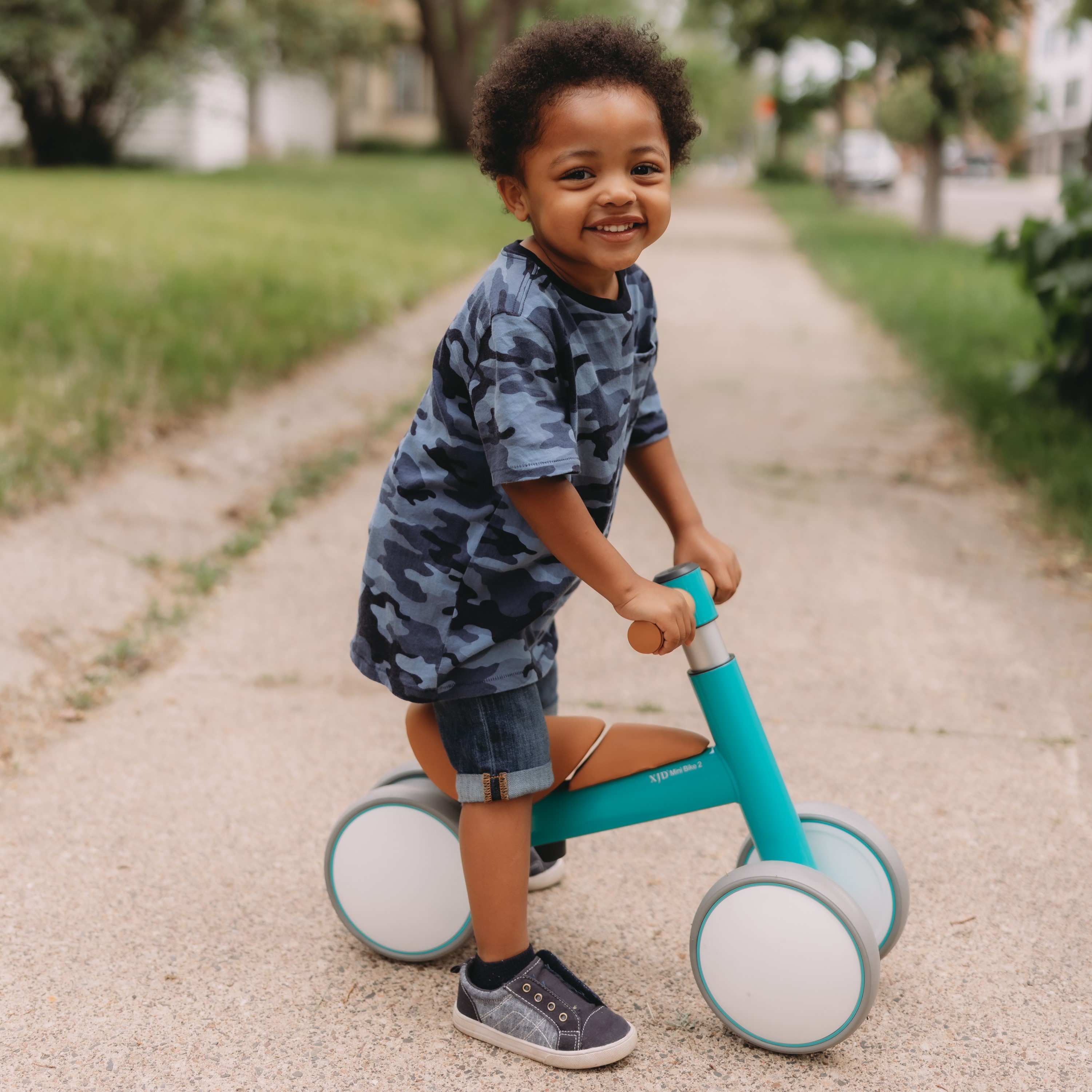 little boy on bike