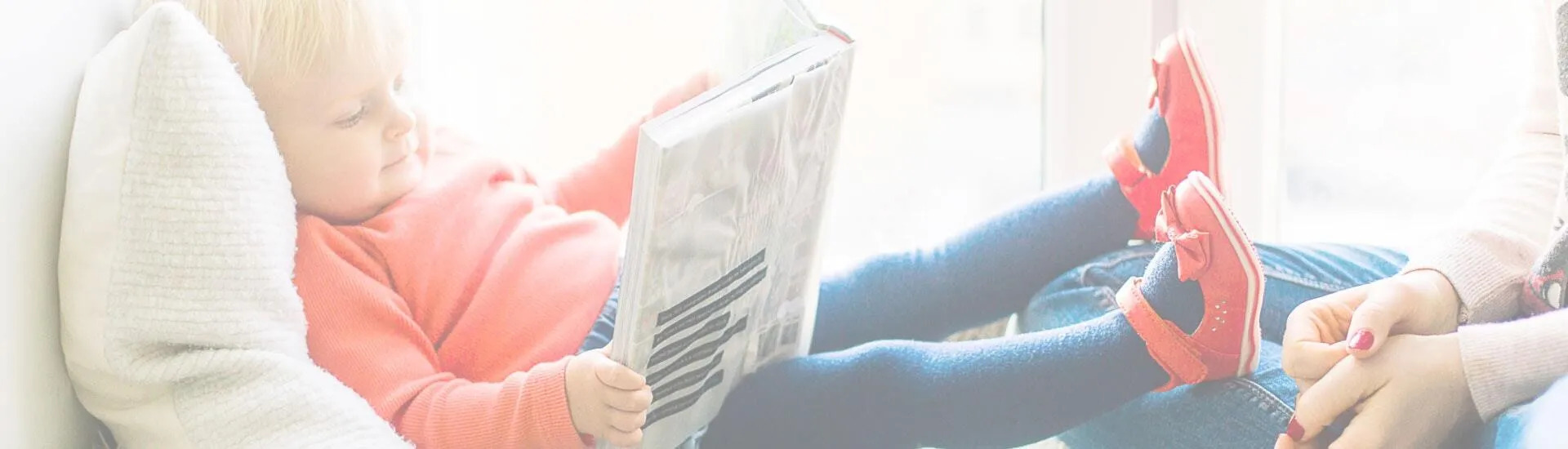 Kid reading a book