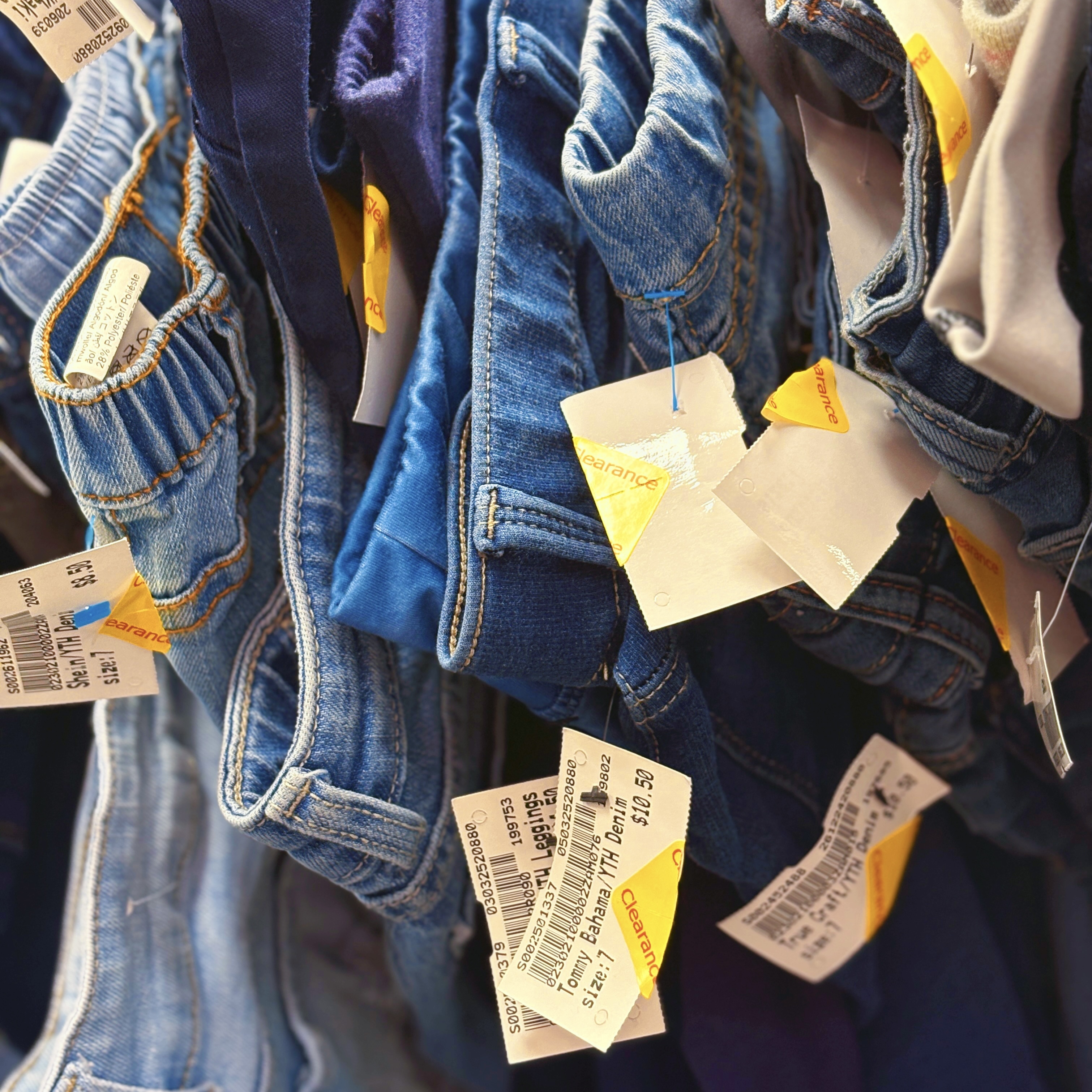 Kid’s jeans with clearance tags