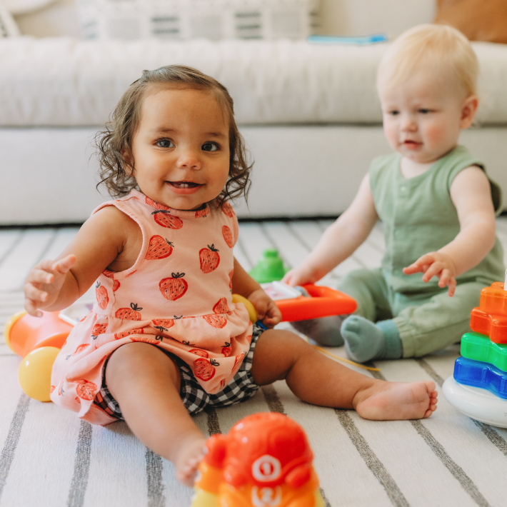 Girl playing with toys - Cash for Toys.