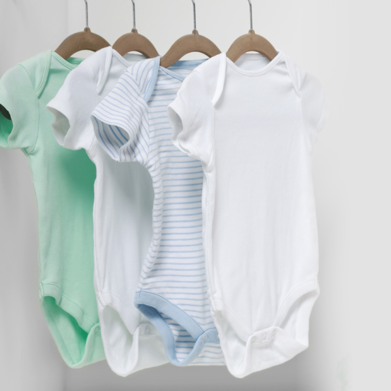 Girl in athletic clothes playing tennis