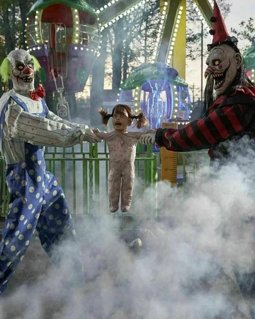Life Size 6.5 Ft. Animated Tug of War Circus Clowns with Child Halloween Prop