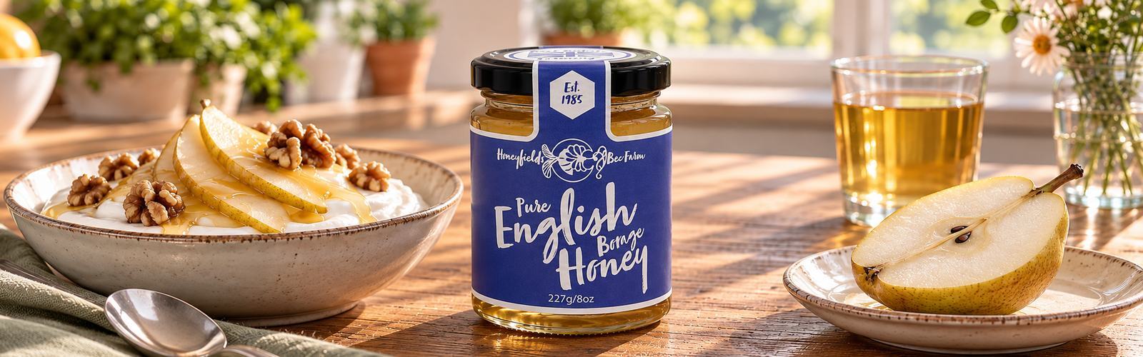 Jar of delicate English Borage Honey on a breakfast table