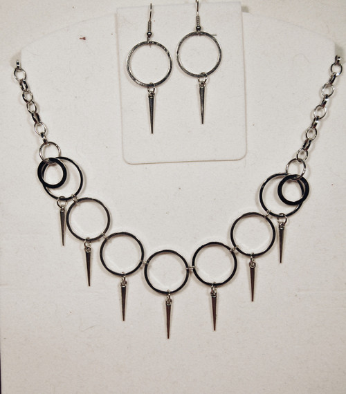 Silver circles with daggers necklace set