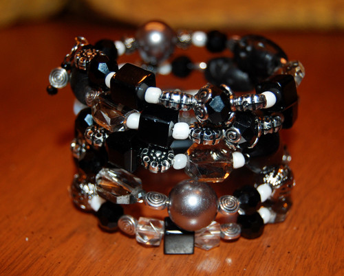 Black beads with a shot or two of white and grey wrap bracelet