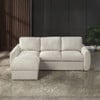 Nuriel beige sectional in a room setting. Rug, plants, artwork and other decorative accessories are not included.
