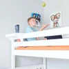 Stella White Bedside Shelf with Cupholder on Bed with Child