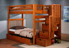 Banning Honey Twin over Twin Bunk Bed with Stairs shown with Optional Twin Trundle