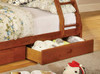 Gaines Oak Twin over Full Bunk Bed with Storage Drawer Detail