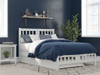 Dodie White Full Size Platform Bed Frame shown with Optional Twin Size Trundle Closed Room