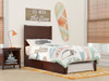 Nico Walnut Twin Bed Frame with Headboard shown with Optional Twin Size Trundle Closed Room