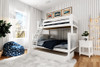 Anaya White Bunk Bed Twin over Full shown with Optional Twin Storage Trundle Angled View Room