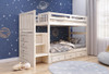 Colbin Weathered White Twin Bunk Bed with Stairs shown with Optional Set of 3 Storage Drawers Room