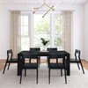 Rockport Distressed Black Dining Table Set Front View shown with Black Chairs Room