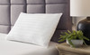 Zephyr 2.0 White Cotton Pillow lifestyle image staged on bed