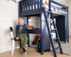 Baldwin Blue Twin Loft Bed with Desk and Storage Child at Desk