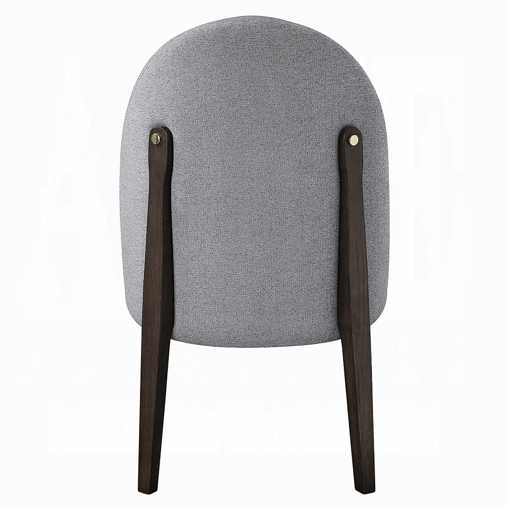 Rear view of the included Clayten chair with espresso legs and gold-tone accents.