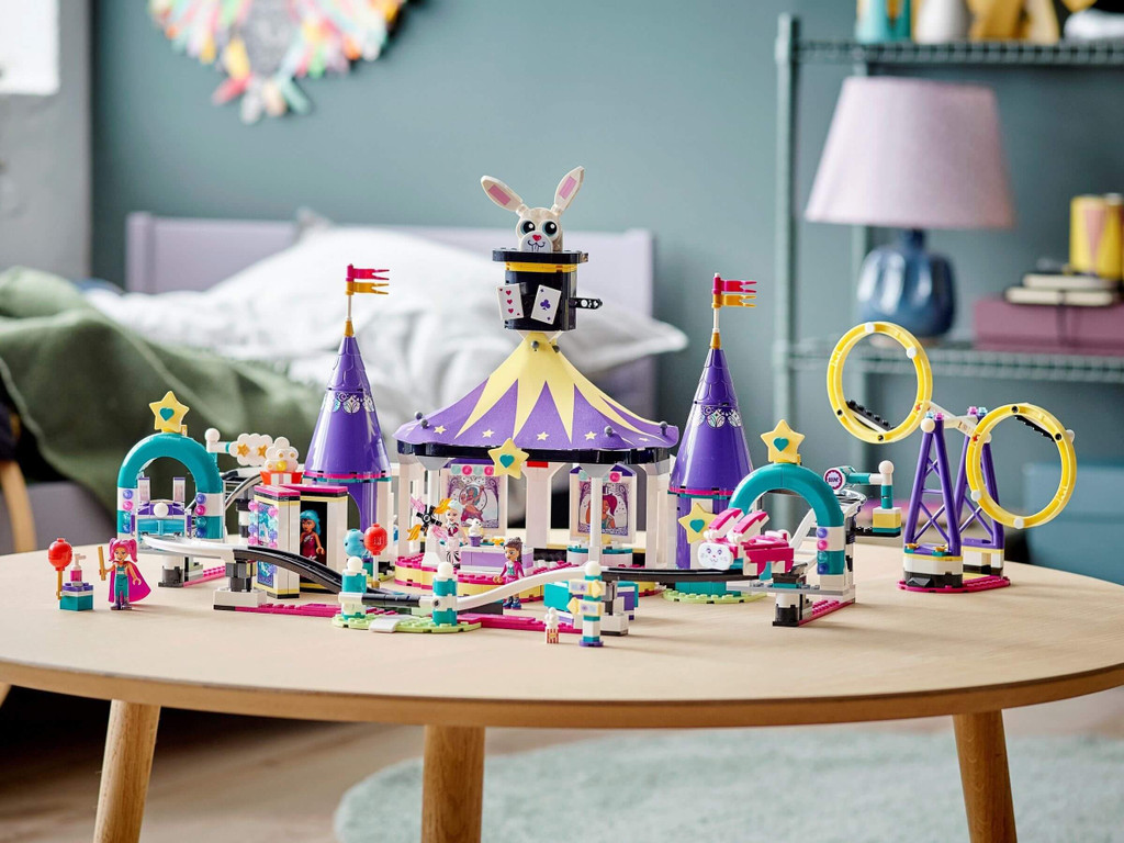 Lego Friends Magical Funfair Roller Coaster 41685 in room on table