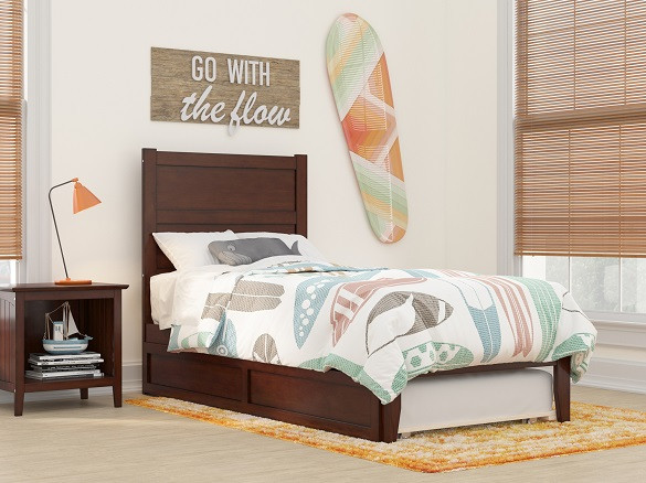 Nico Walnut Twin Bed Frame with Headboard shown with Optional Twin Size Trundle Closed Room