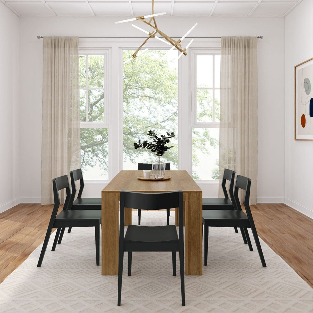 Rockport Distressed Pecan Dining Table Set End View shown with Black Chairs Room