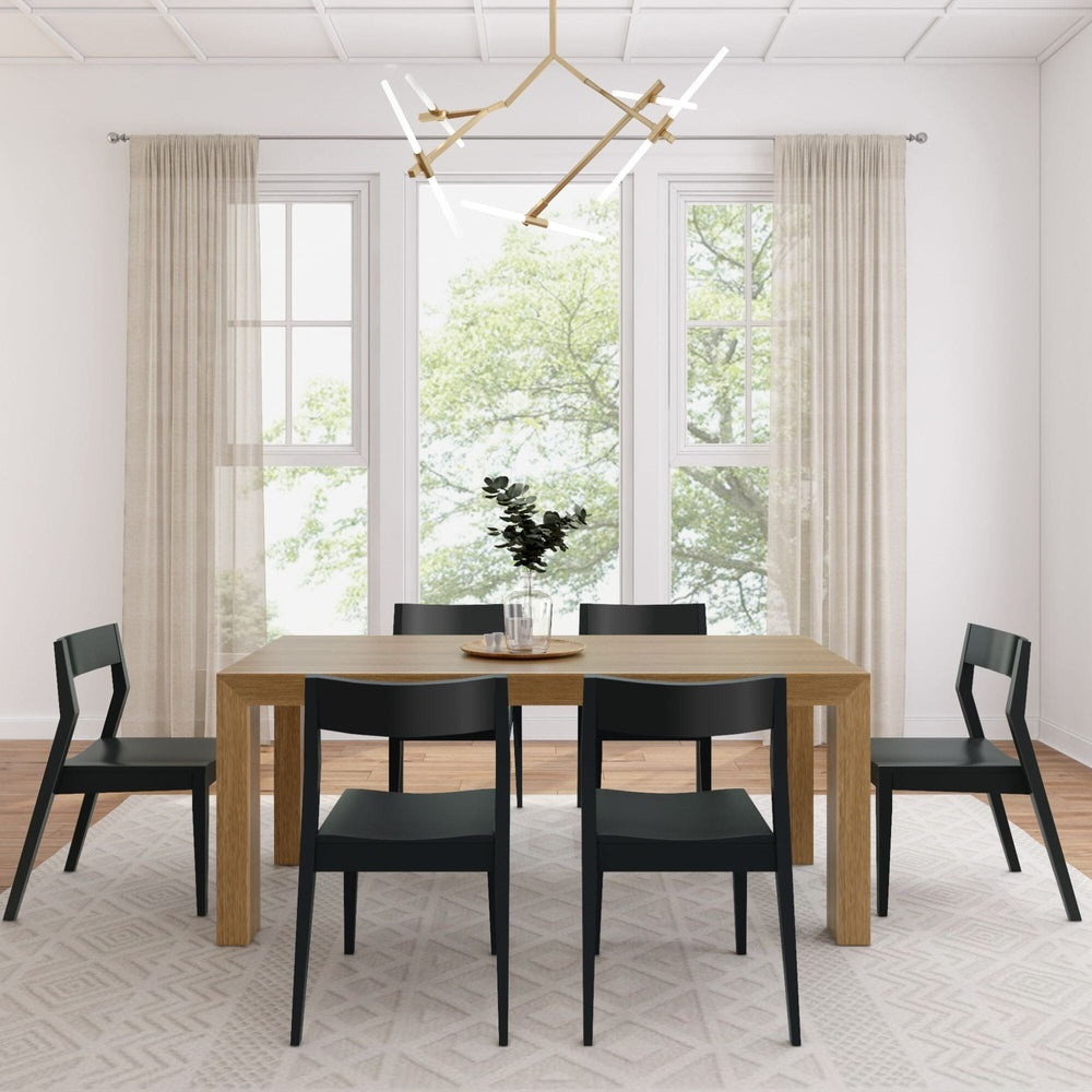 Rockport Distressed Pecan Dining Table Set Front View shown with Black Chairs Room