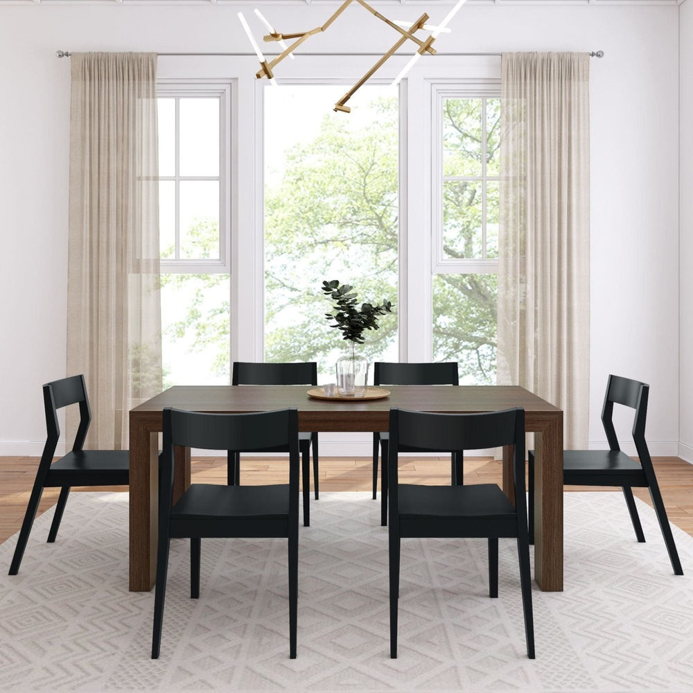 Rockport Distressed Walnut Dining Table Set Front View shown with Black Chairs Room