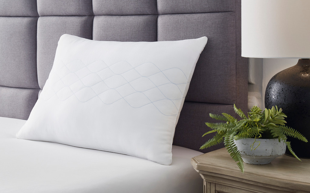 Zephyr 2.0 Huggable Comfort Pillow lifestyle image bed