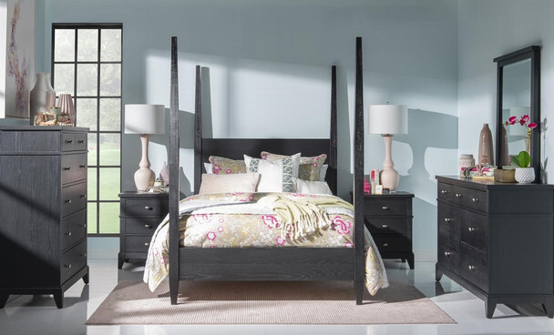 Crossroads black four poster bed in a styled bedroom