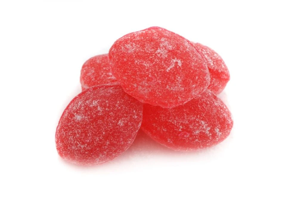 Bright red, sugar-sanded Claey's Hard Candy, raspberry flavor. Approx 75 pieces per pound, nostalgic, Made in USA.