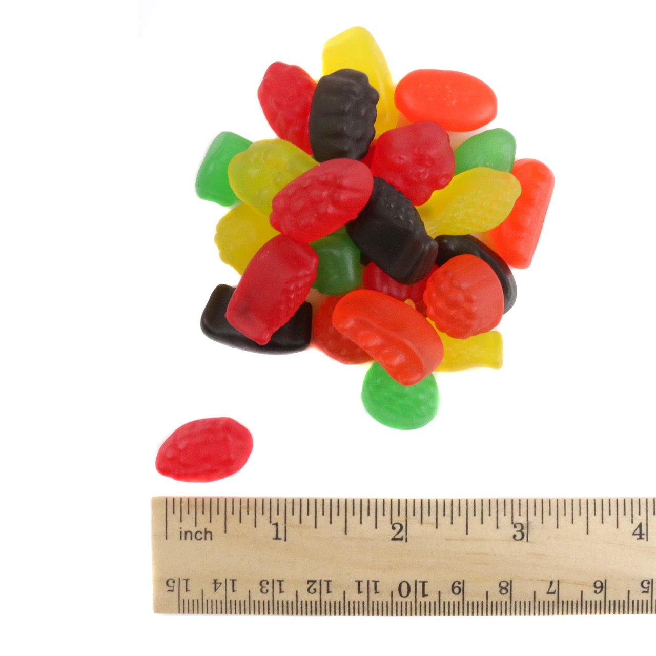 Jujyfruits chewy candy, assorted fruit and vegetable shapes. Red, orange, yellow, green, black pieces, approximately 170 per pound.